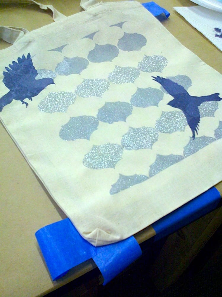 background stencil with birds on tote bag