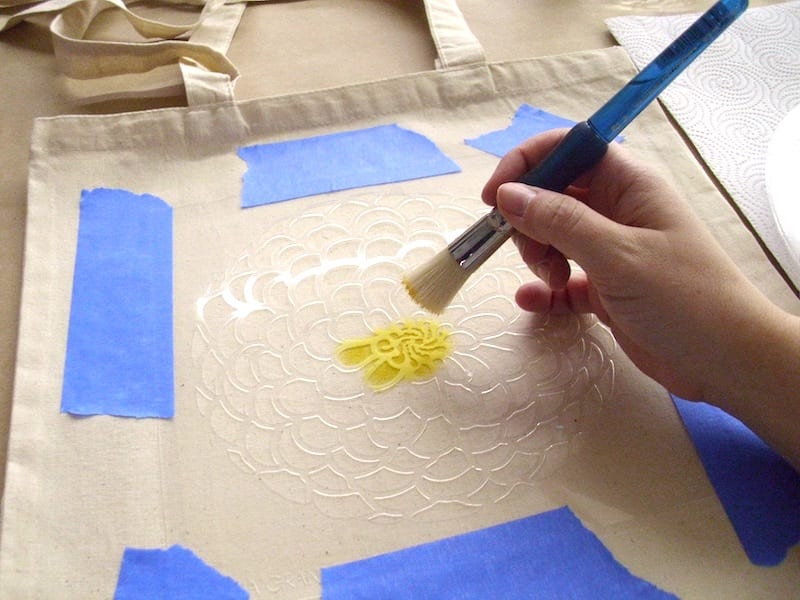 stenciling a tote bag