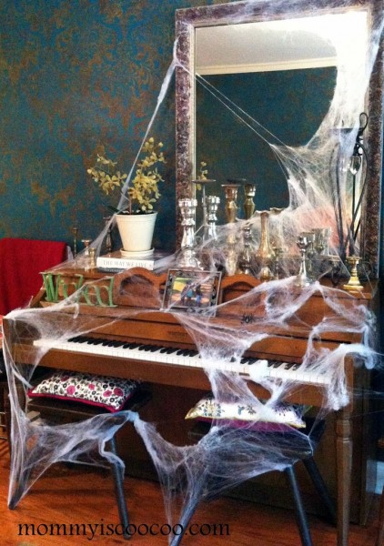 Faux cobwebs are an easy way to decorate for Halloween! via Mommy is Coocoo Faux cobwebs are an easy way to decorate for Halloween! via Mommy is Coocoo