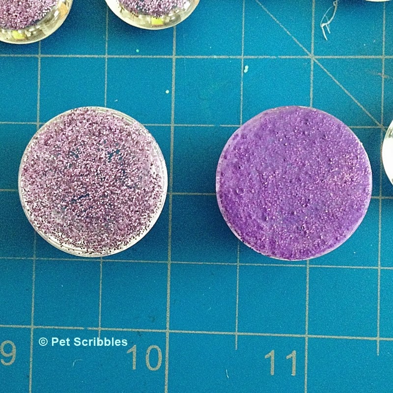 Glitter Marble Magnets DIY: Apply a layer of matching craft paint over the dried glitter paint to fill in any "gaps" from the glitter.