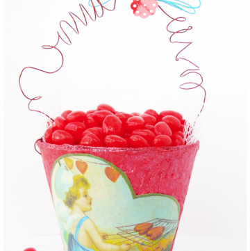 This Red Hot Valentine Container is a sweet, vintage-style gift idea for Valentine's Day. Use Mod Podge and a peat pot for heart-shaped cinnamon candy!