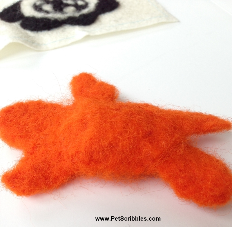 An orange needle-felted blob: a craft fail proudly shared by Laura of Pet Scribbles!