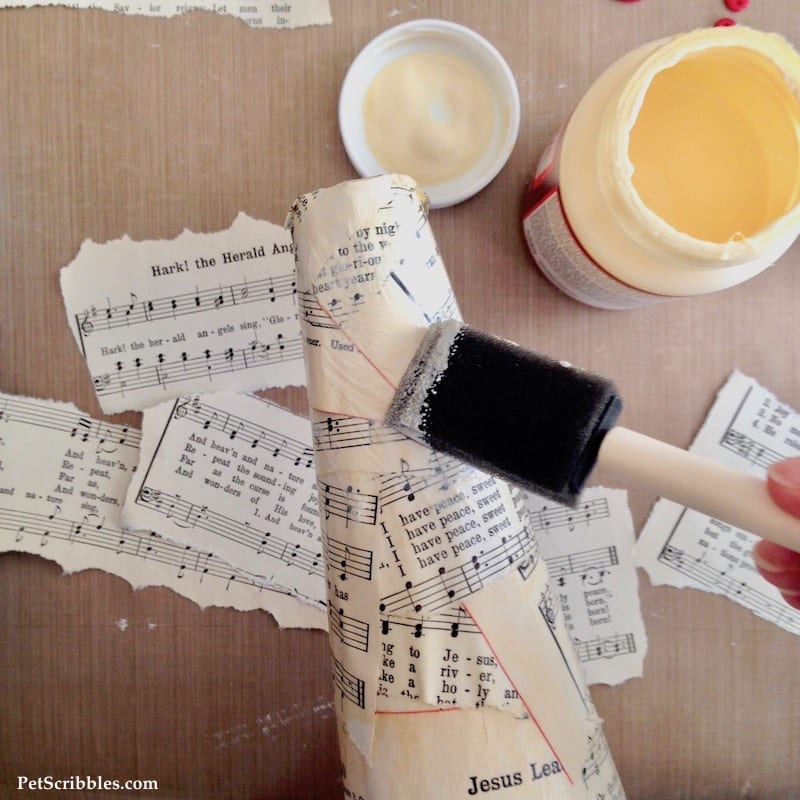 Sheet Music Santa Hat made with a Styrofoam cone, sheet music and Mod Podge!