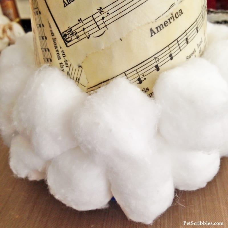 Sheet Music Santa Hat made with a Styrofoam cone, sheet music and Mod Podge!