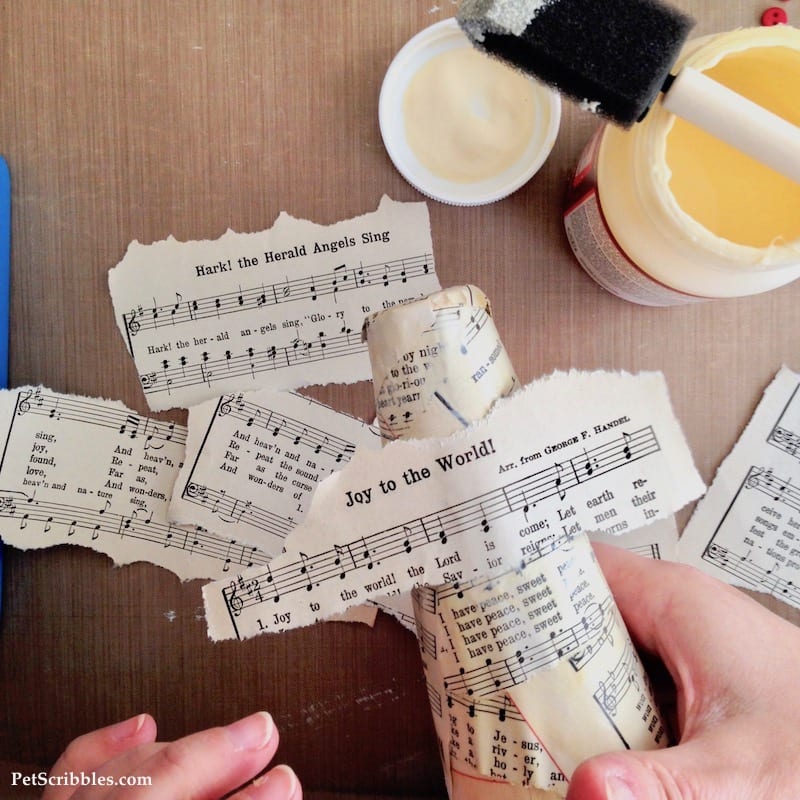 Sheet Music Santa Hat made with a Styrofoam cone, sheet music and Mod Podge!