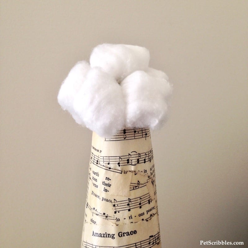 Sheet Music Santa Hat made with a Styrofoam cone, sheet music and Mod Podge!