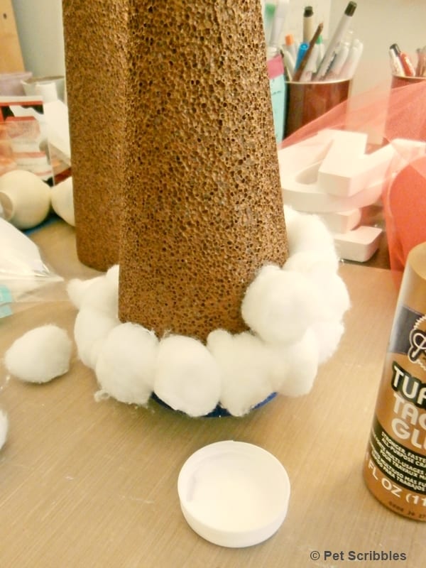 making a cotton ball Christmas tree