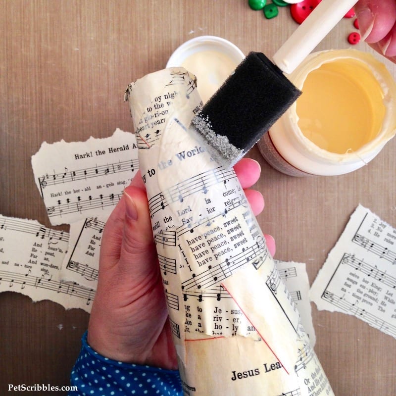 Sheet Music Santa Hat made with a Styrofoam cone, sheet music and Mod Podge!