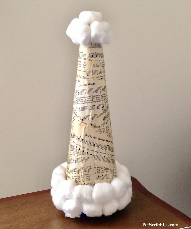 Sheet Music Santa Hat made with a Styrofoam cone, sheet music and Mod Podge!