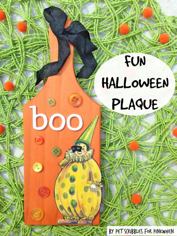 Fun Halloween Plaque using buttons and a vintage image, with the wood paddle dyed instead of painted! The vintage seam binding is the finishing touch!