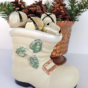 A vintage Santa boot gets a pretty makeover for a white Christmas! I love how easy it is to do with paint and glitter glue!
