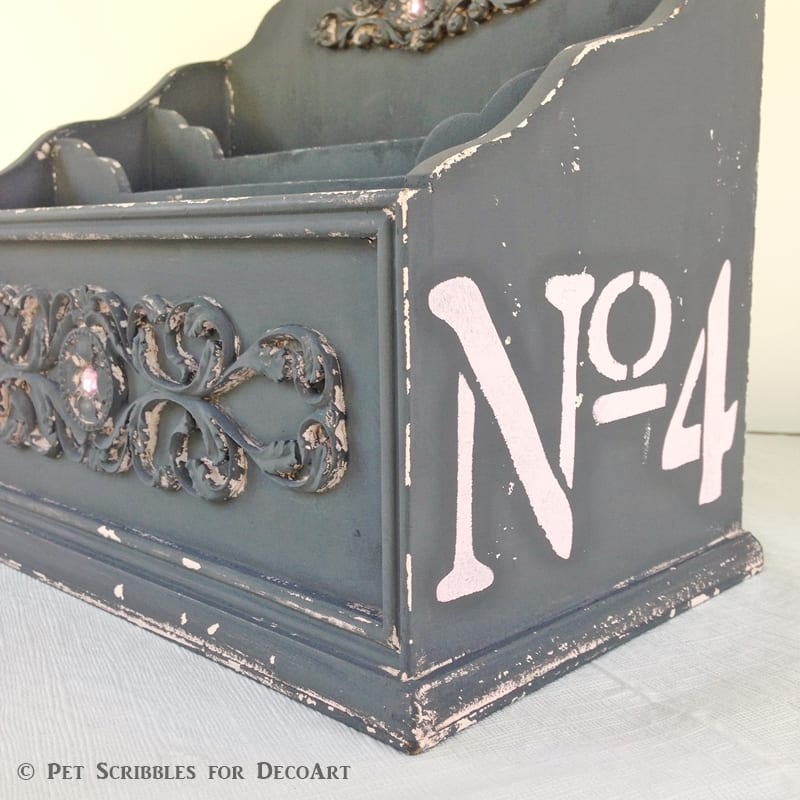 Number stencils on art supply caddy