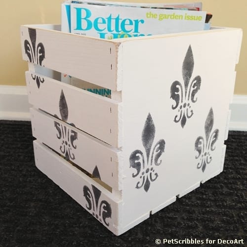 Paint a wooden crate for stylish magazine storage!