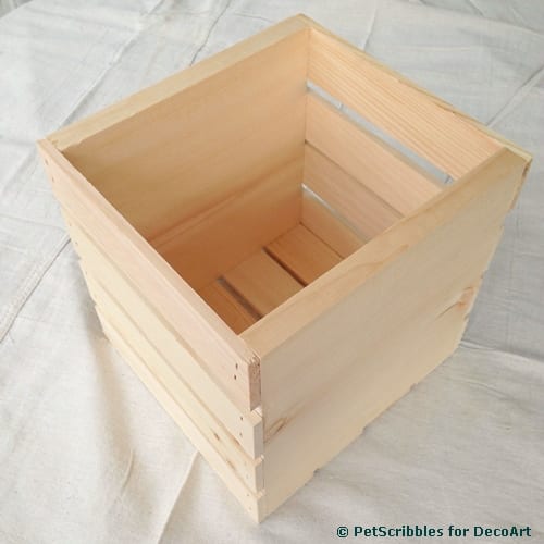 Paint a wooden crate for stylish magazine storage!