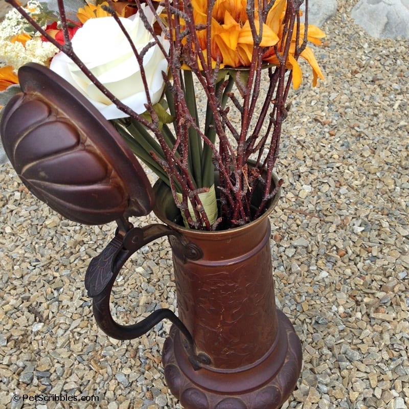 Rusty beer stein plus faux flowers equals Fall!