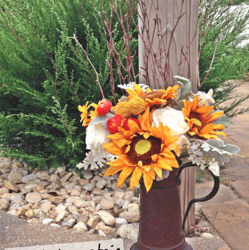 Rusty beer stein plus faux flowers equals Fall!