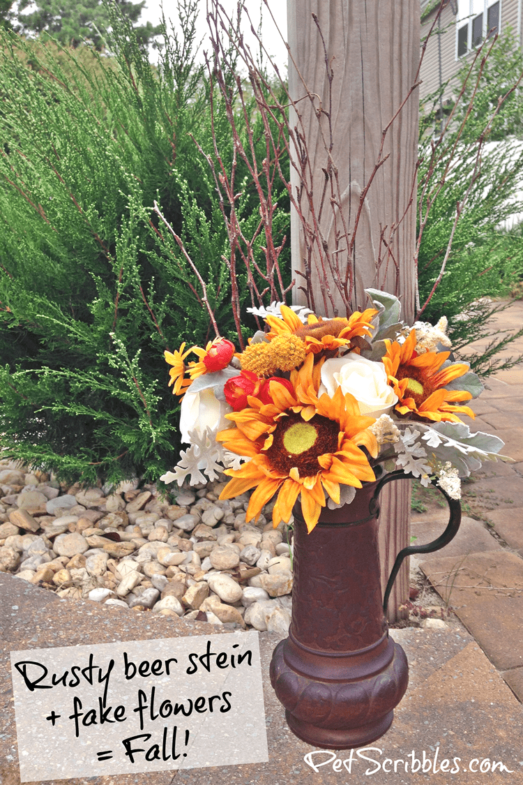 Rusty beer stein plus faux flowers equals Fall!