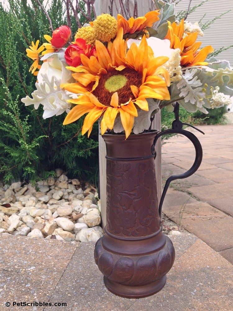 Rusty beer stein plus faux flowers equals Fall!