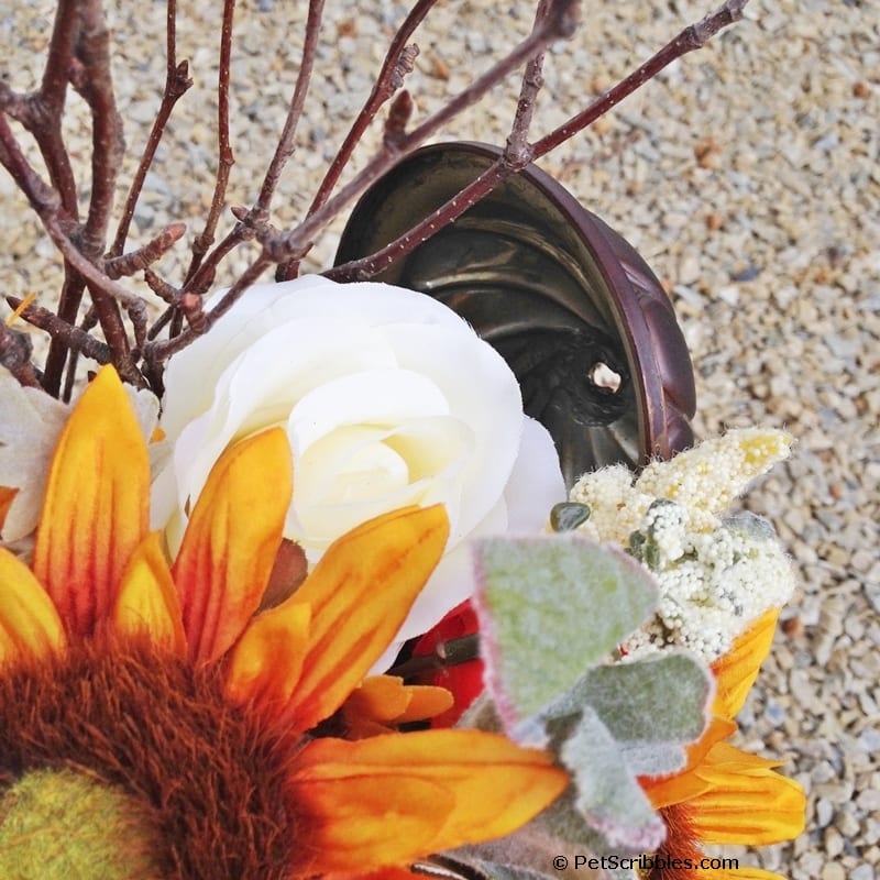 Rusty beer stein plus faux flowers equals Fall!