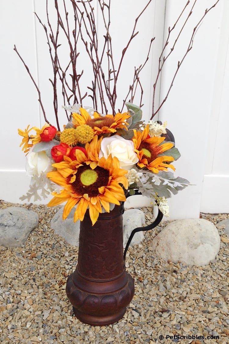 Rusty beer stein plus faux flowers equals Fall!