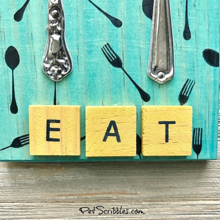 Make this colorful Fork and Spoon Kitchen Art using vintage adhesive embellishments instead of actual utensils! Yes, the fork and spoon are dimensional stickers! So fun and so many possibilities!
