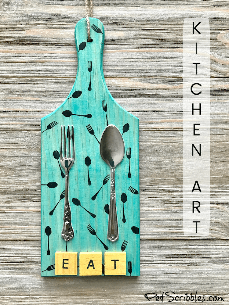 Make this colorful Fork and Spoon Kitchen Art using vintage adhesive embellishments instead of actual utensils! Yes, the fork and spoon are dimensional stickers! So fun and so many possibilities!