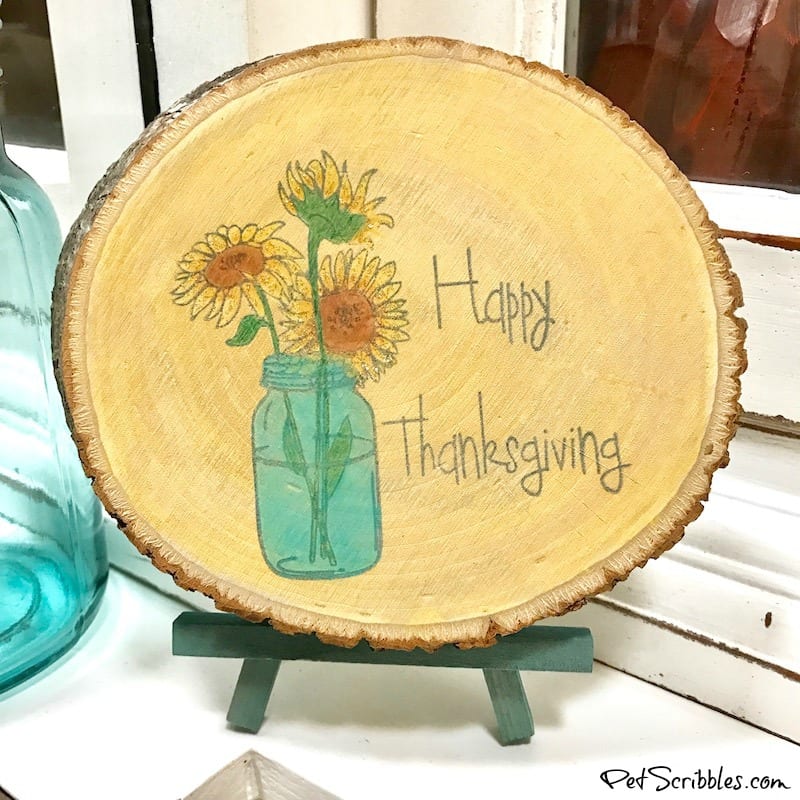 close up of a Thanksgiving decor wood slice