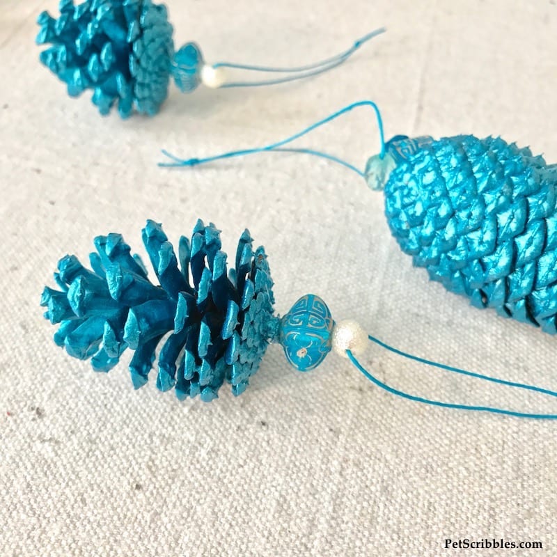 metallic teal pinecone ornaments