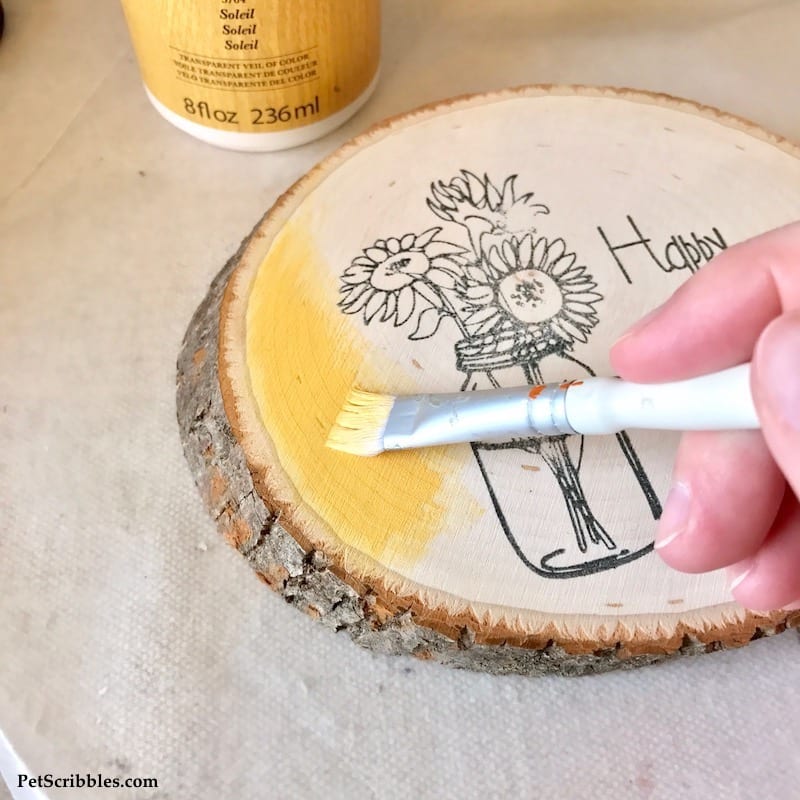 yellow color stain applied onto a wood slice