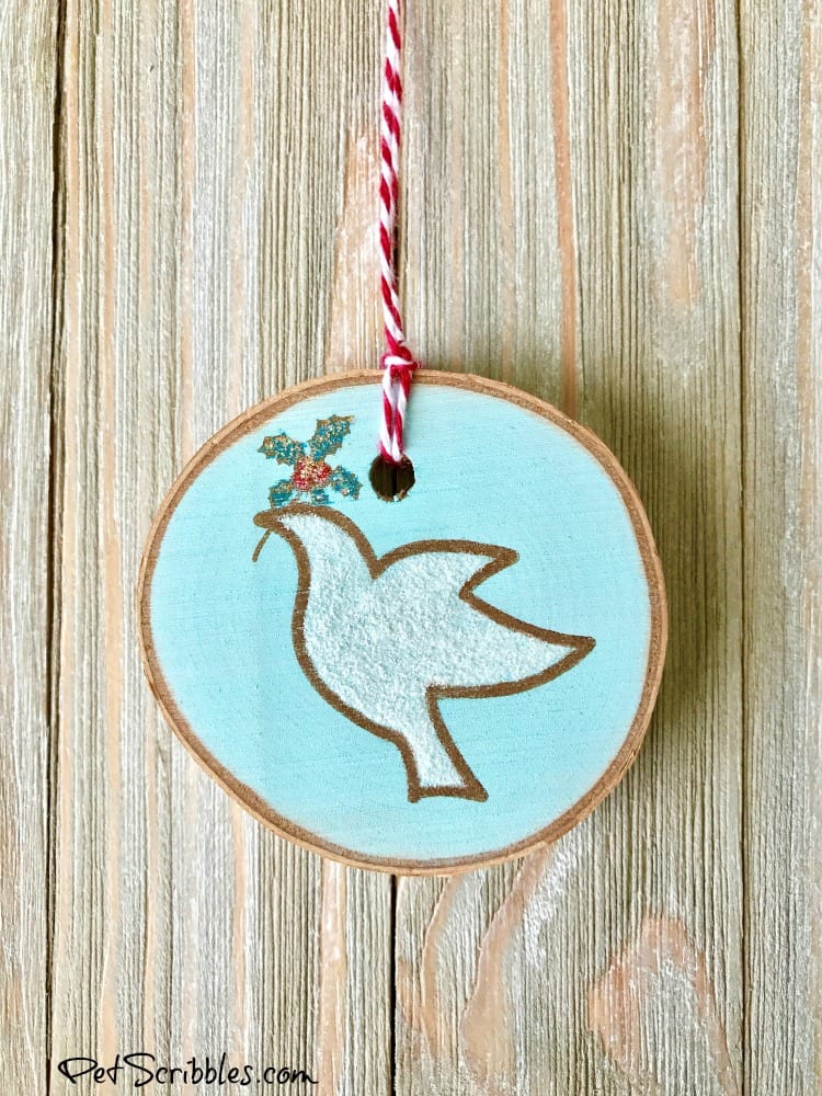 How to stamp charming wood slice ornaments for Christmas!