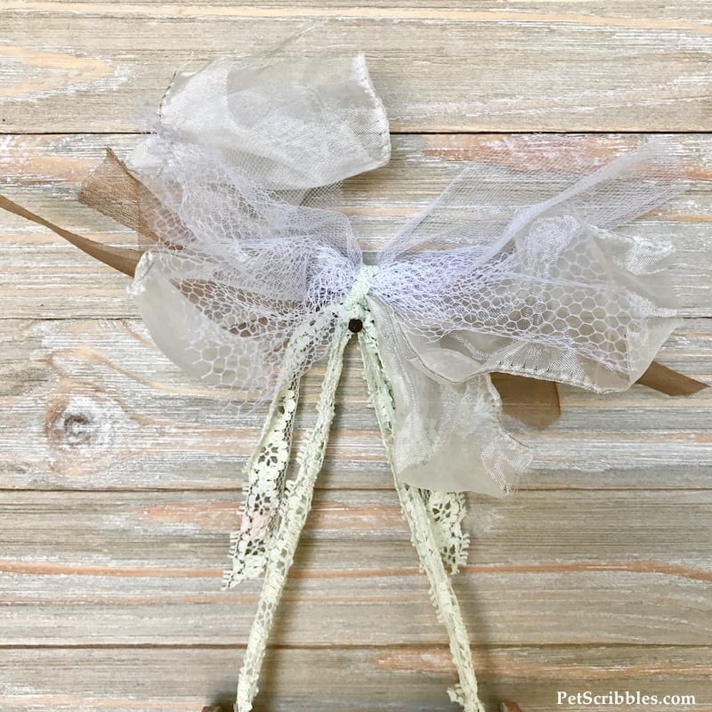 shabby rustic bow created with ribbon scraps and lace
