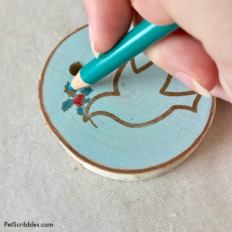 using colored pencils on wood slice ornaments