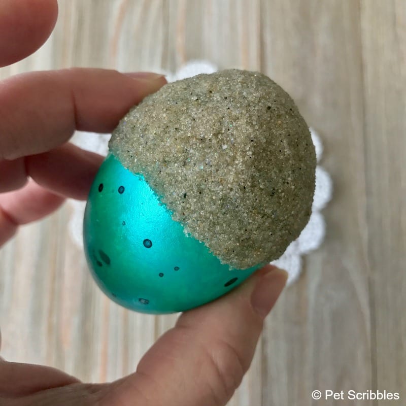 how to glue sand to a fake egg