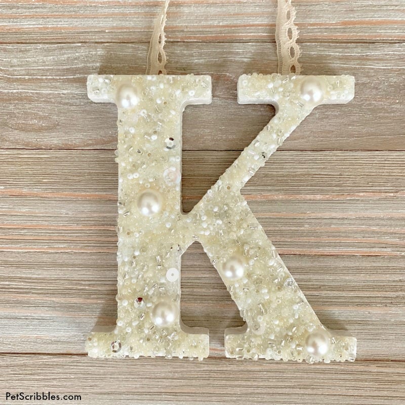 letter K covered in pearls and seed beads