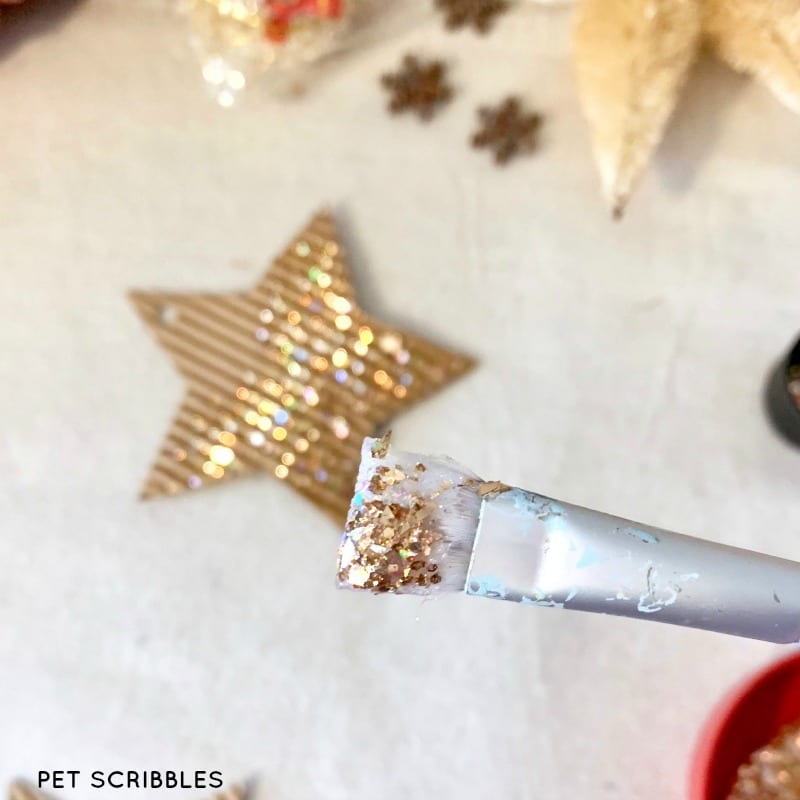 DIY glitter cardboard star ornaments