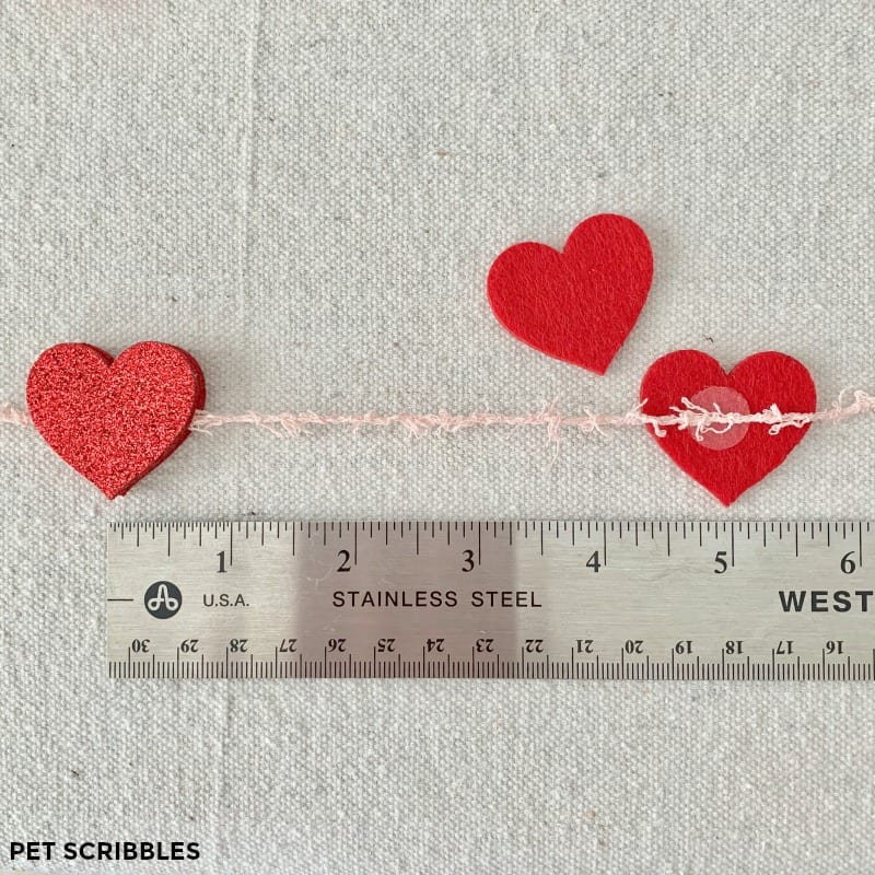 attach red felt hearts with glue dots