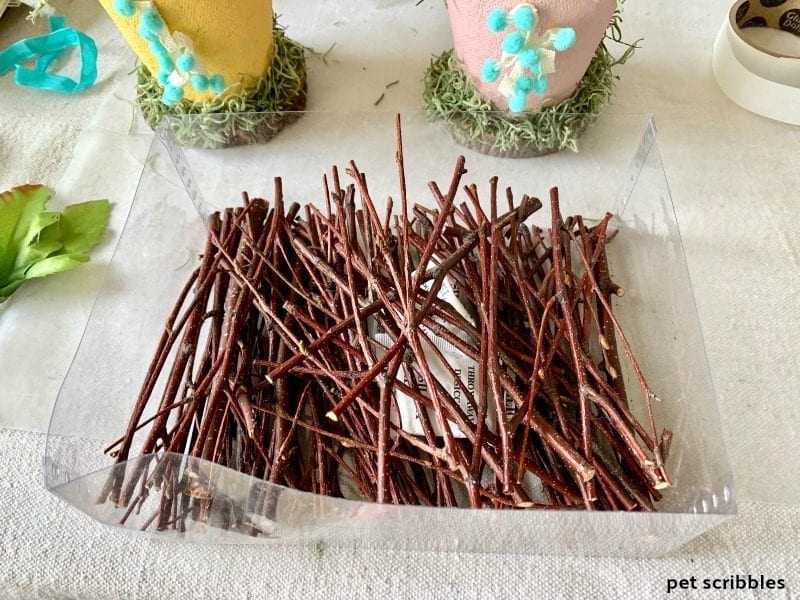 a box of small twigs for crafting