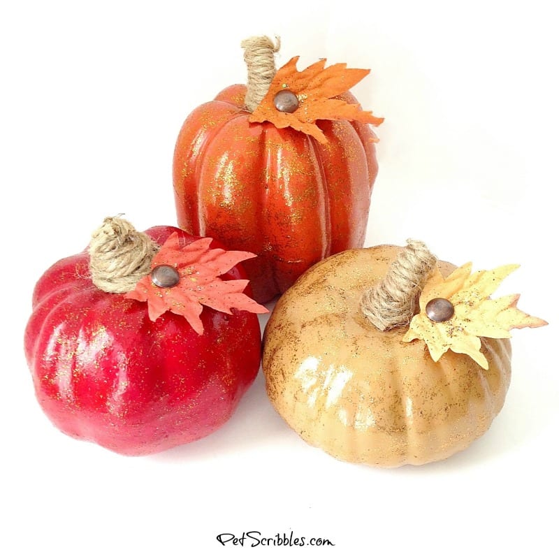 tone on tone painted and glittered dollar store pumpkins