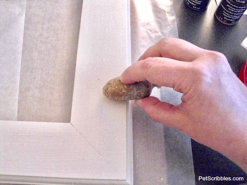 candle wax applied to painted wood