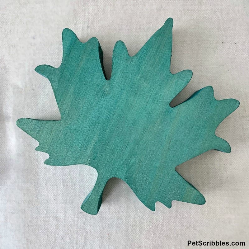 teal painted wooden leaves