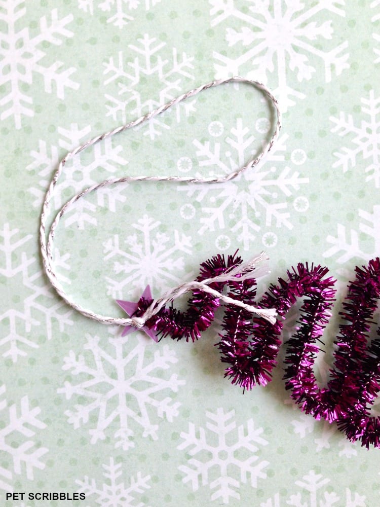 attaching baker's twine as the ornament hanger