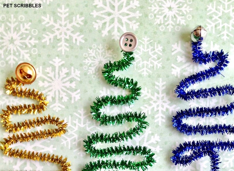 use jingle bells or buttons as the tree toppers