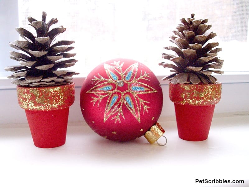 pinecone trees in red pots