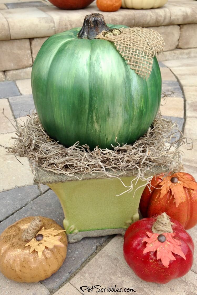 DIY mercury glass pumpkin with green shades of metallic paint