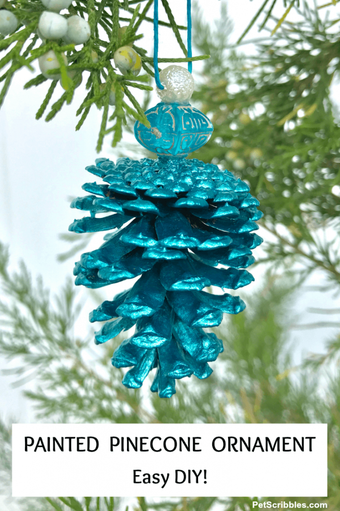 pretty painted pinecone ornament in teal