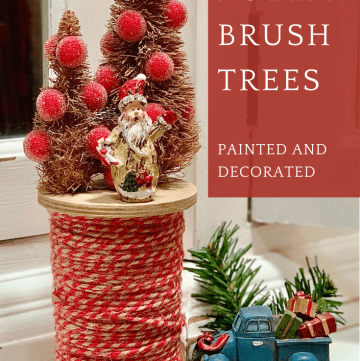 rustic bottle brush trees on a large spool