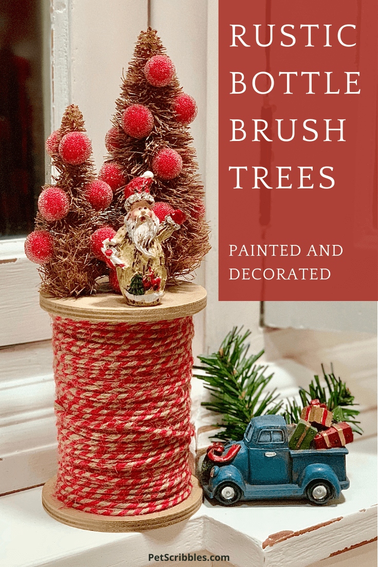 rustic bottle brush trees on a large spool