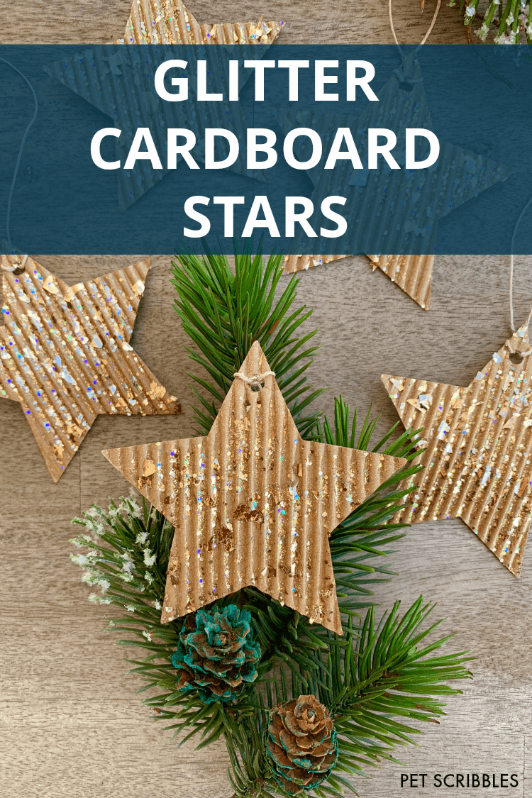 glitter cardboard star ornaments and decorative holiday greenery